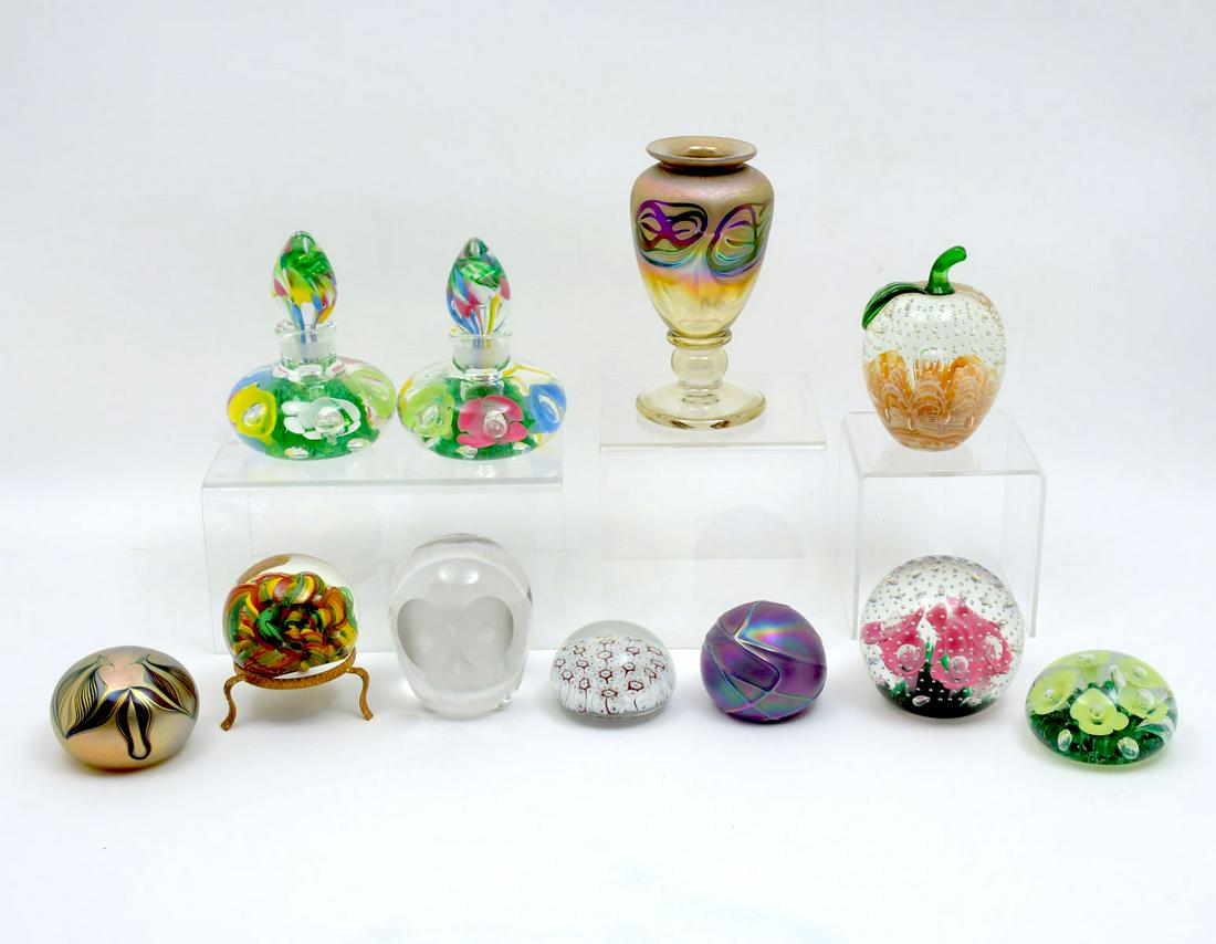11 PC. ART GLASS PAPERWEIGHT & PERFUME BOTTLE: 11 PC. ART GLASS PAPERWEIGHT & PERFUME BOTTLE: Including makers such as Joe St. Clair, Rollin Karg, Murano, Zephyr, & more. Largest Approx. 6'' h x 3'' w.