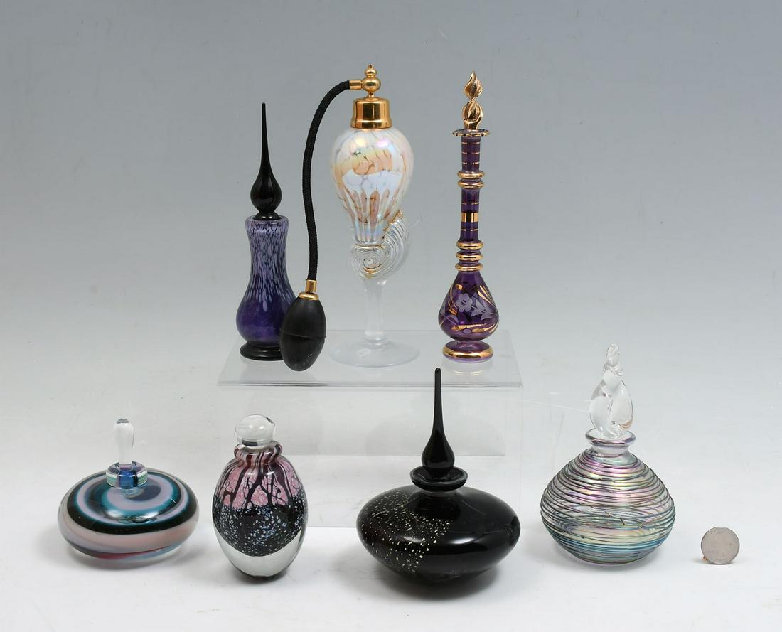 WALL DISPLAY WITH PILL BOXES & PERFUME BOTTLES: 7 PC. ART GLASS PERFUME BOTTLE COLLECTION: Including Egyptian glass, Iridescent glass with thread work, Karg, Eicholt, & more. Largest Approx. 8'' h x 2.5'' w.