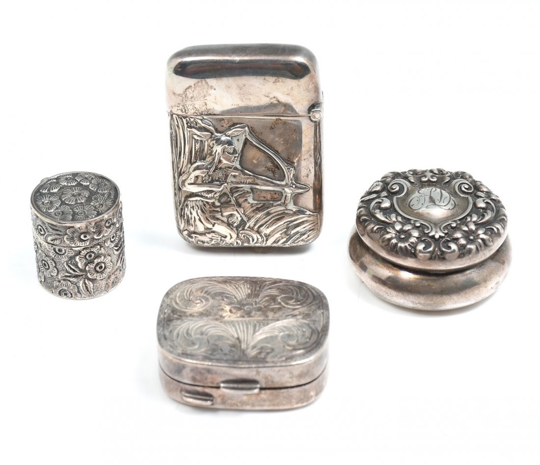 4 PC. STERLING SILVER BOXES: 4 PC. STERLING SILVER BOXES: Approx. 3.25 Troy ounces. Comprising; 1- Compact, having a mirror, scrolling foliate design, monogrammed. 1- Sterling pill box. 1- Mathc safe, having a Native American ind