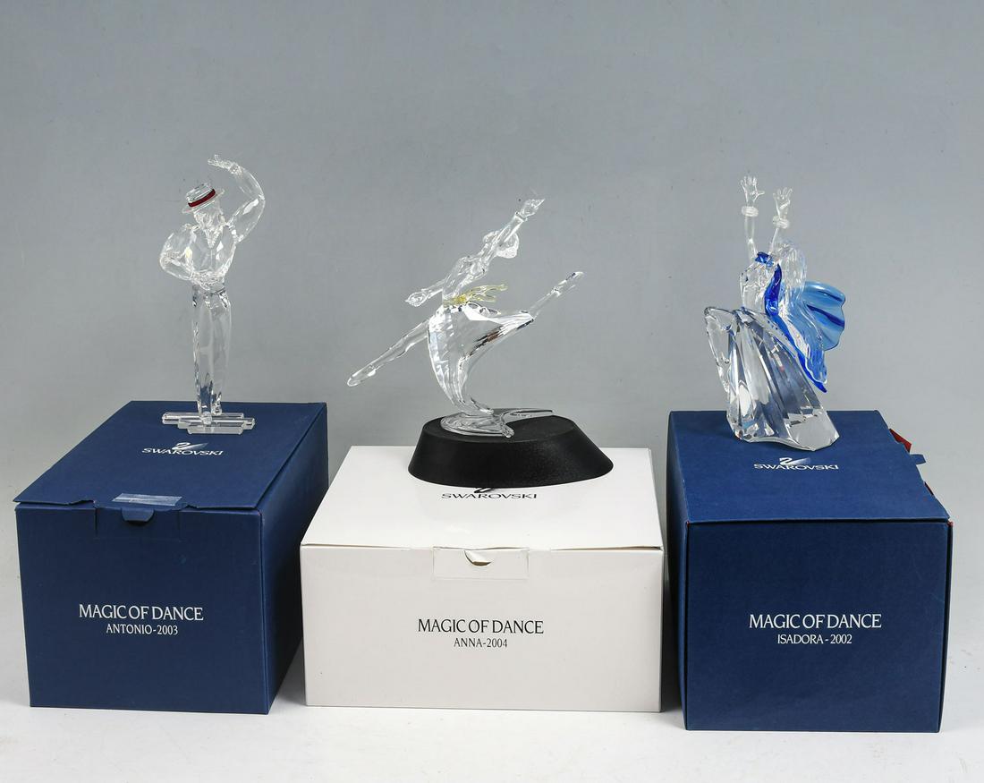 3 SWAROVSKI ANNUAL PIECES - MAGIC OF DANCE: MAGIC OF DANCE: 1) 2002 Isadora is inspired by Isadora Duncan. Created from smooth and faceted clear crystal with blue crystal accents. Base and name plate included; 2) 2003 Antonio, a graceful piece 