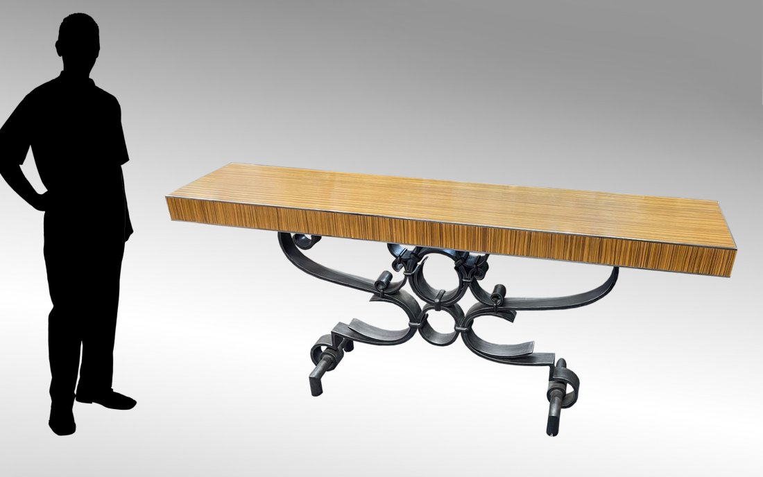 THEODORE ALEXANDER EXOTIC TIGERWOOD CONSOLE TABLE: THEODORE ALEXANDER EXOTIC CONSOLE TABLE: Theodore Alexander Console Table: Raised on a delicately scrolled metal base, Accented with an exotic wood veneer or laminate? top in fruitwood resembling tige