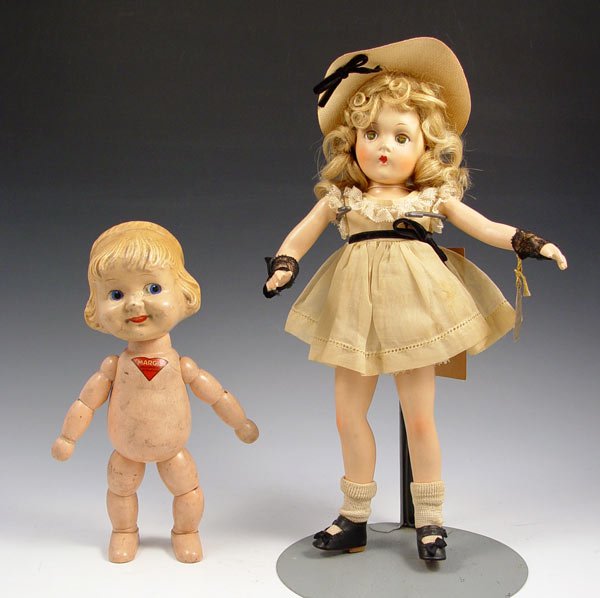 MADAME ALEXANDER WENDY ANN & KALLUS MARGIE : 2 VINTAGE DOLLS MADAME ALEXANDER WENDY ANN AND KALLUS MARGIE: 1) Madame Alexander composition Wendy Ann with original clothes, post card and tag. Sleepy eyes are cloudy. 13" tall. 2) Wood Joseph Kallu