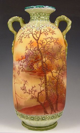 LARGE HAND PAINTED NIPPON VASE: LARGE HAND PAINTED NIPPON VASE: Two handles, moriage decoration on hand painted landscape. 11 1/2" h. Morimura brothers mark.