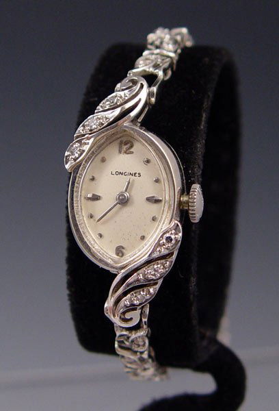 14K LONGINES DIAMOND WATCH CA. 1960: 14K LONGINES DIAMOND WATCH CA. 1960: 14K white gold ladies wristwatch. Case and clasp are marked 14K. Triple signed, case, movement and dial. All original. Movement is Longines 4LLV high grade 17 jewe