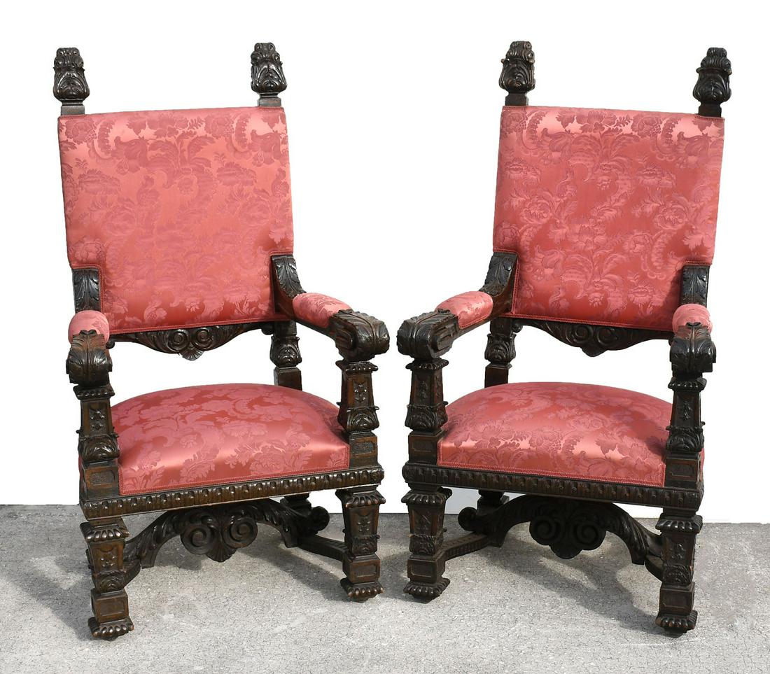 19TH C. CARVED ITALIAN WALNUT ARMCHAIRS: 19TH C. CARVED ITALIAN WALNUT ARMCHAIRS: Pair of carved Italian Walnut armchairs, having Acanthus leaf finials. First quarter 19th century, in Renaissance taste. Approx. 54.5'' h x 30'' l x 24'' w.