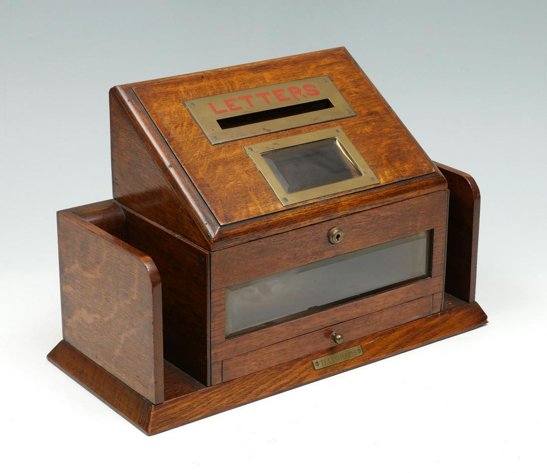 ENGLISH ANTIQUE OAK LETTER BOX: ENGLISH ANTIQUE OAK LETTER BOX: Locking letter & telegram drop box, having beveled glass, brass mounts & hardware. Approx. 11.5'' h x 17.5'' l x 8.25'' w.