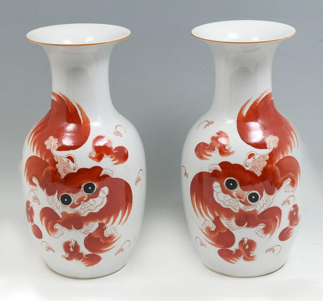 LARGE CHINESE REPUBLIC PERIOD FOO LION VASES: LARGE CHINESE REPUBLIC PERIOD FOO LION VASES: Opposing pair of Chinese Republic period porcelain vases, having red glazed Foo dogs at the observe, and a poem in kanji, at the verso. Approx. 16.25'' h 