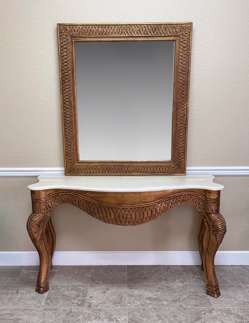 WHITE MARBLE TOP CONSOLE TABLE AND MIRROR: WHITE MARBLE TOP CONSOLE TABLE AND MIRROR: Table & Mirror have an overall carved intertwining oval ring design. Table raised on cabriole legs with leaf knees and hoven feet. Table Approx. 33.25" h x 6
