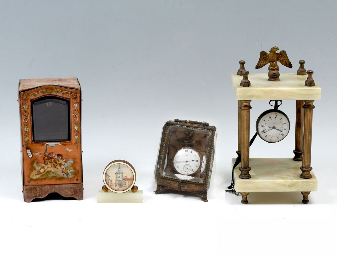 4 PIECE POCKET & CARRIAGE WATCH/CLOCK LOT: 4 PIECE POCKET & CARRIAGE WATCH/CLOCK LOT: Comprising; 1- Pocket watch with key, hanging on an Eagle surmounted onyx carriage, 1- Watch mounted on an onyx base, 1- Carriage box with painted figural sc