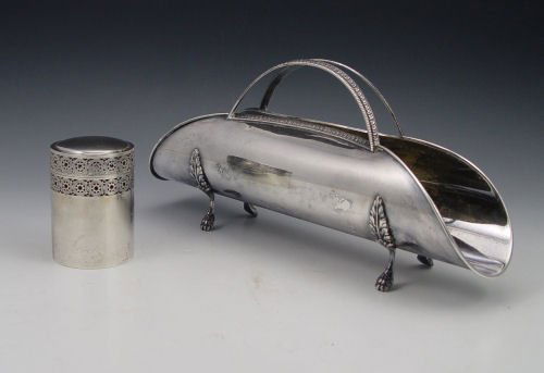 2 PIECE CONTINENTAL SILVER BREADSTICK & BOX: 2 PIECE CONTINENTAL SILVER BREADSTICK HOLDER & BOX: To include 1) 800 silver breadstick holder on 4 paw feet. 6'' h x 12 1/2'' x 3''. 2) Reticulated 800 silver cylinder box with removable lid. Marked