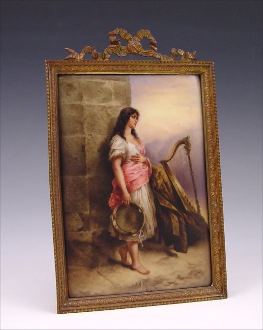PAINTED PORCELAIN HUTSCHENREUTHER PLAQUE: PAINTED PORCELAIN HUTSCHENREUTHER PLAQUE "Heirnatlos", after Kray: Encased in a beautifully embossed frame of the period. Impressed mark verso with original paper label, 5 7/8" x 4", encased in gilt m