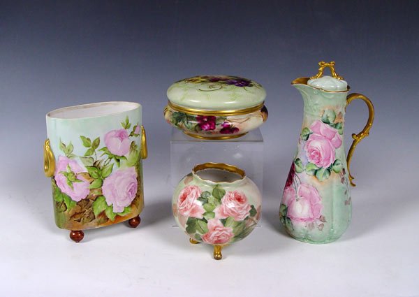 4 PIECE FRENCH LIMOGES : 4 PIECE FRENCH LIMOGES: 1) Rose decorated chocolate pot, CH Field Haviland mark, 11"h. 2) Pansy decorated covered dresser box, 7' dia. Tresseman & Vogt. 3) Unmarked rose decorated rose bowl, 5 1/2" di