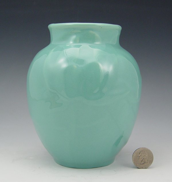 ROOKWOOD IRIS GLAZE VASE 6833: ROOKWOOD POTTERY LOTUS VASE: High glaze blue vase, 6'' height. Date mark 1949, Shape # 6833.