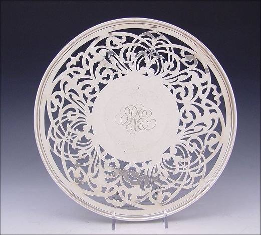 MAUSER STERLING RETICULATED TRAY: MAUSER STERLING RETICULATED TRAY: Openwork design tray on center foot, monogrammed. 1" high x 10 1/2". Approx. 10.2 troy oz.