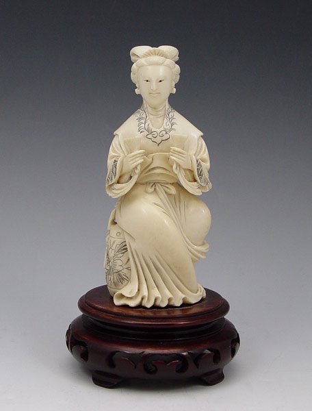 CHINESE CARVED IVORY FIGURE: CHINESE CARVED IVORY FIGURE: Figure of a woman holding 2 libation cups. Affixed to wood stand. Figure measures 4 7/8", overall 6 1/2".