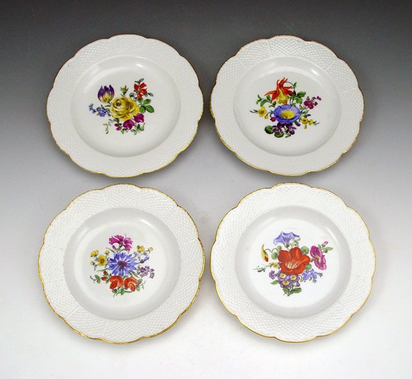 SET OF 4 MEISSEN HAND PAINTED PLATES: SET OF 4 MEISSEN HAND PAINTED PLATES: Each basket weave border plate centers a hand painted floral spray, gold rim. Blue cross sword marks (scratched through)., 6 3/4" dia.