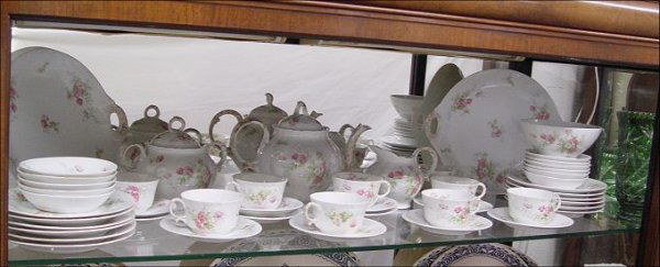 FRENCH LIMOGES BREAKFAST / DESSERT CHINA 49PC: FRENCH LIMOGES BREAKFAST OR DESSERT CHINA SERVICE: Jean Pouyat, Ca. 1891-1932. Approx. 49 pieces to include teapot, creamer, covered sugar, 2 pierce handle serving plates, 12 plates ( 7.5"), 11 fruit