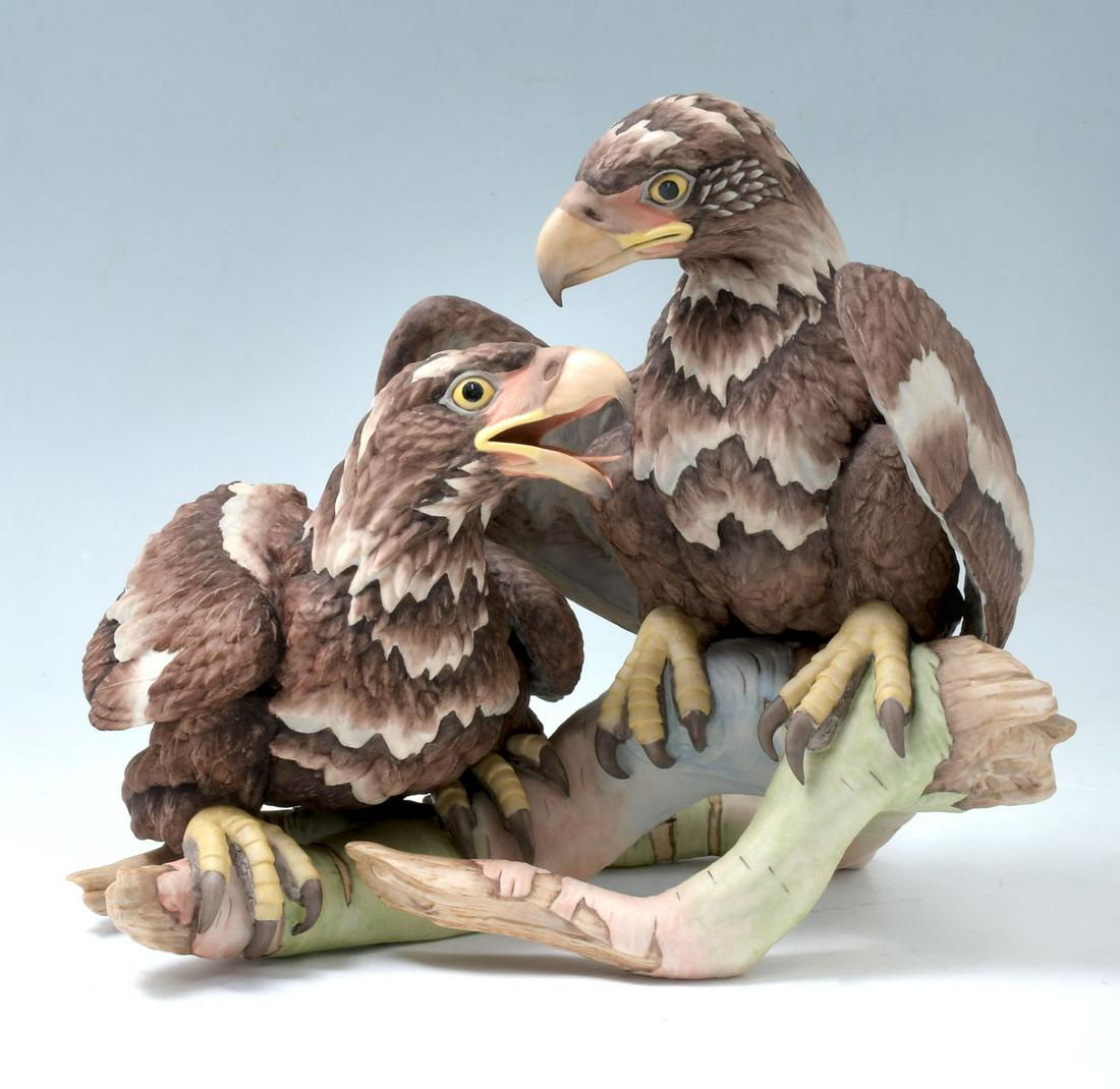 BOEHM AMERICAN BALD EAGLE & BOEHM BOOK: BOEHM "AMERICAN BALD EAGLE" 400-49 & BOEHM BOOK: A painted porcelain Boehm eaglet group perched on a branch, signed Boehm on base, marked Boehm / Edward Marshall Boehm / American Bald Eagle / 400-49 /