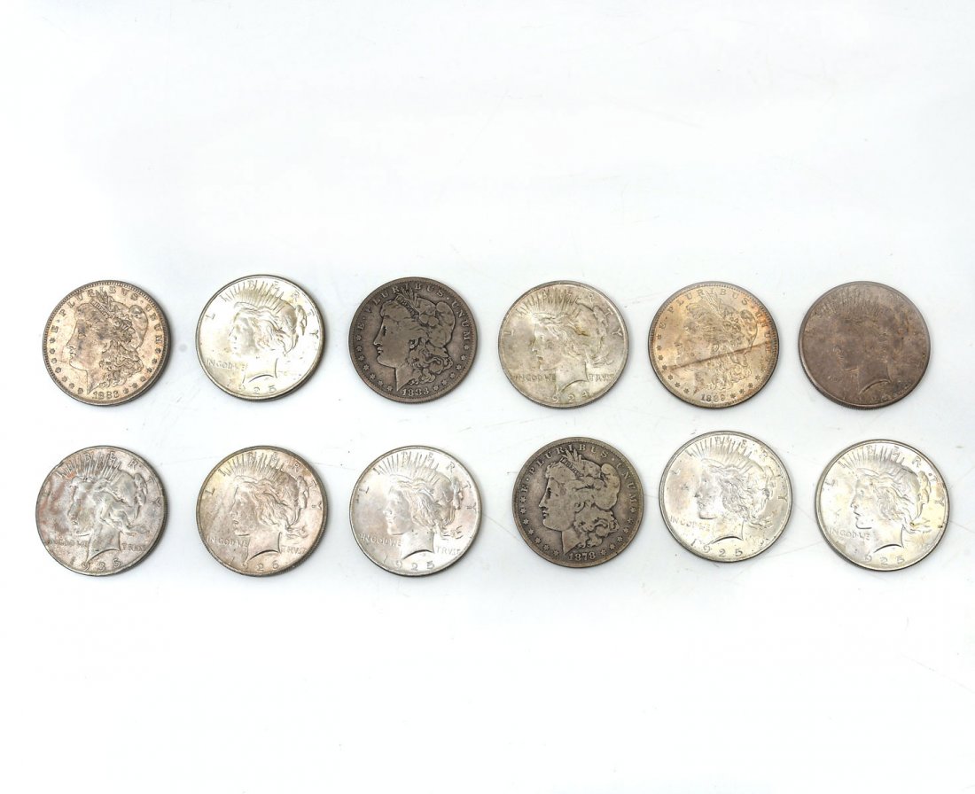 12 PIECE MORGAN AND PEACE SILVER DOLLARS: 12 PIECE MORGAN AND PEACE SILVER DOLLARS: Comprising; 1- 1878, 2- 1883, 1- 1889, 1- 1923, 1- 1924, 4- 1925, 1- 1926, & 1- 1935. All ungraded.