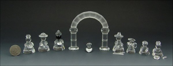 SWAROVSKI CRYSTAL 9 PIECE NATIVITY SCENE: SWAROVSKI CRYSTAL 9 PIECE NATIVITY SET WITH ARCH: 1991 Holy Family with Arch, retired 1993, Mary, Joseph and baby Jesus; 1992 (3) Wise Men, retired 1993 one with detached arm and gift; 1992 Shepherd, 