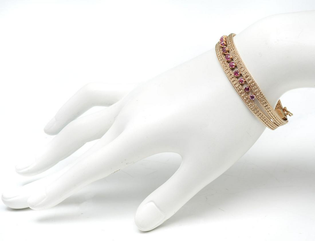 14K PINK SAPPHIRE BRACELET: 14K PINK SAPPHIRE BRACELET: 14K yellow gold bracelet contains 12 round mixed cut pink sapphires. WEIGHT: 2.00 Ct. Approx. Rated VS in clarity (Type II), stpR in Hue, 4 in Tone and 3 in Saturation. The