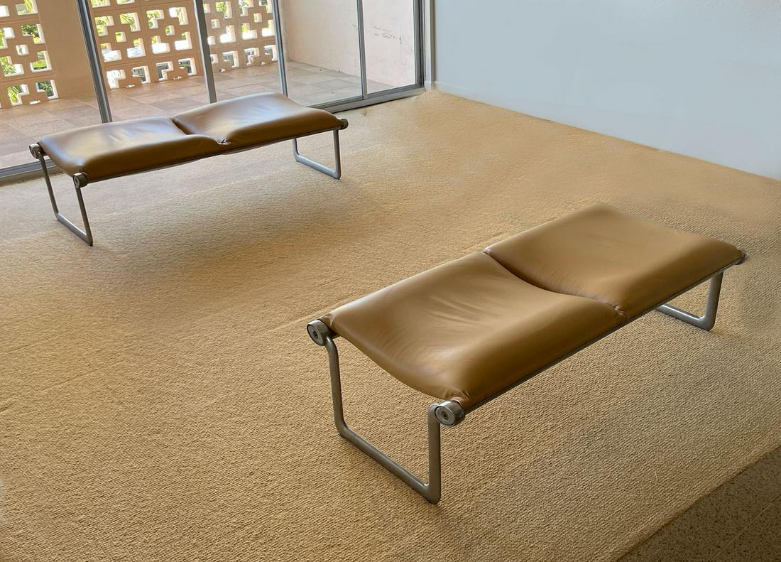 TWO MORRISON & HANNAH KNOLL INTERNATIONAL BENCHES: TWO MORRISON & HANNAH KNOLL INTERNATIONAL BENCHES: Pair of mid-century modern benches, having an aluminum frame with tan leather upholstery. Approx. 16'' h x 55'' l x 25.5'' w.