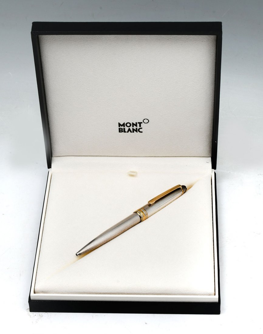 MONTBLANC MEISTERSTUCK STERLING SILVER PEN IN BOX: MONTBLANC MEISTERSTUCK STERLING SILVER PEN IN BOX: Montblanc Meisterstuck Solitaire Sterling Silver Ballpoint Pen with box. Pen Approx. 5.25" l. Box Approx. 1.5" h x 6.75" l x 7" w.