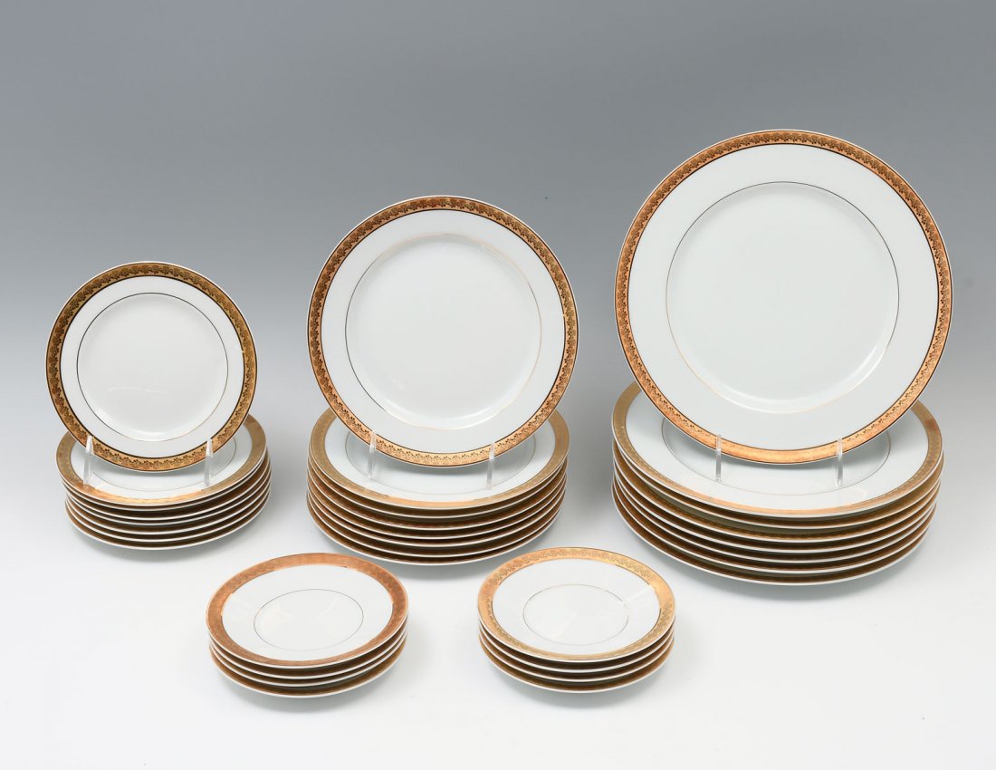 BERNARDAUD LIMOGES "RHAPSODY" DINNERWARE: BERNARDAUD LIMOGES "RHAPSODY" DINNERWARE: Bernardaud Limoges "Rhapsody" porcelain dinnerware with gold rim. Comprising; 8- Dinner plates, 8- Luncheon plates, 8- Bread plates, & 8- Dessert plates. Larg