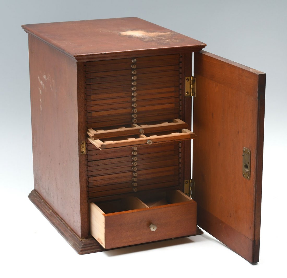 VICTORIAN MICROSCOPE SLIDE CABINET: VICTORIAN MICROSCOPE SLIDE CABINET: 26 Drawer microscope slide cabinet, with numbers mounted at metal pulls. Medical slides with specimens reside in some drawers. Approx. 14.75" h x 10.25" l x 13.25" 