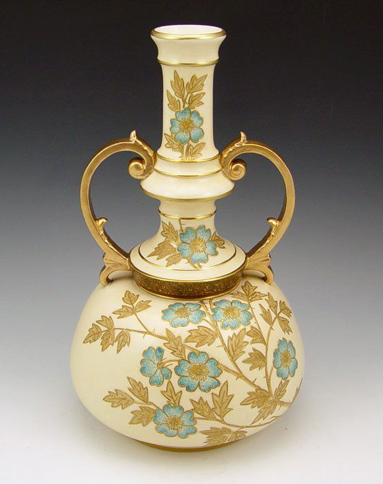 LARGE FAIENCE MFG. GILDED VASE Edward Lycett: LARGE FAIENCE MFG. GILDED VASE: Faience Manufacturing Co. The mark indicates circa 1884-1890, while under the artistic direction of Edward Lycett. Bottle neck vase, enamel and gold decoration. 12" tal