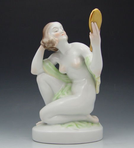 HEREND PORCELAIN NUDE FIGURE: HUNGARIAN HEREND PORCELAIN NUDE FIGURE: Kneeling woman with a mirror, hand painted, 9'' tall.
