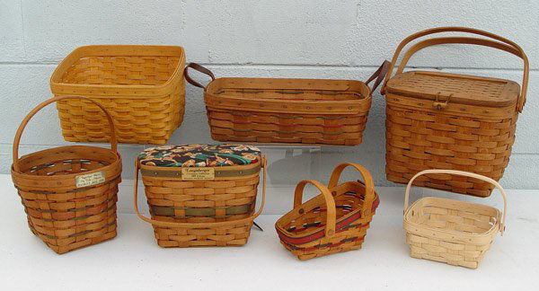 COLLECTION OF 7 LONGABERGER BASKETS: COLLECTION OF 7 LONGABERGER BASKETS: To include Della Wilders 2004, Were on the Move CEW 1987, Bee basket 1990 FMO, Holiday Memory MSW 1989, RIH 2001, BOS 1987 filled with clothes pins & cookie cutter