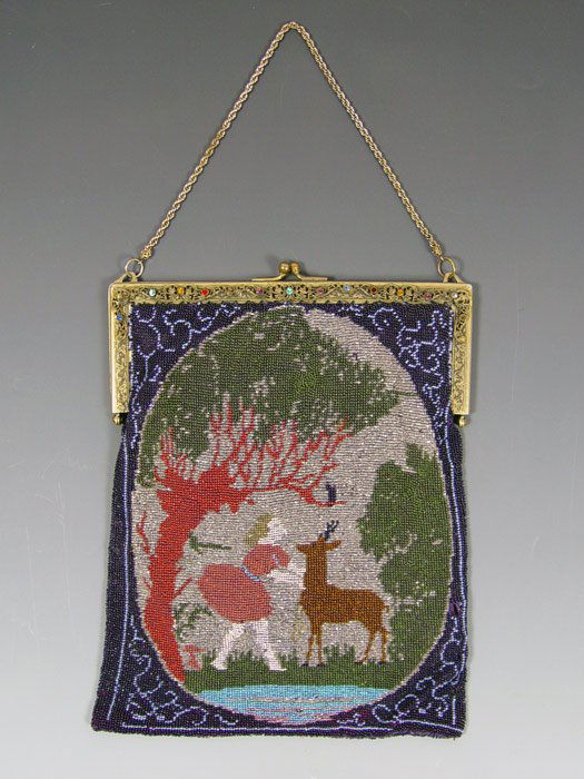 VINTAGE BEADED PURSE: VINTAGE BEADED PURSE: Girl, deer and tree motif. Embossed metal frame set with colored stones, chain handle, satin interior. 10" x 8".