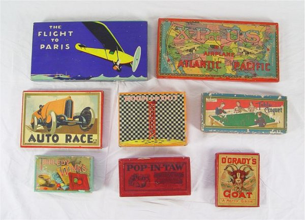 COLLECTION OF 8 VINTAGE BOARD GAMES: COLLECTION OF 8 VINTAGE BOARD GAMES: To include 1) Down and Out, Milton Bradley 1909. 2) Pop-In-Taw, Parker Brothers. 3) Table Croquet, Pressman & Eibtz. 4) Auto Race, Clover. 5) O'Grady's Goat, Milto