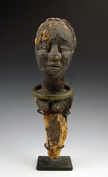 ANTIQUE CARVED WOOD AFRICAN STATUE: ANTIQUE CARVED WOOD AFRICAN STATUE: With metal necklace, 12" h.