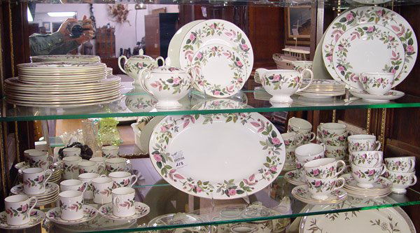 WEDGWOOD FINE CHINA SERVICE HATHAWAY ROSE PATTERN: WEDGWOOD FINE CHINA SERVICE IN THE HATHAWAY ROSE PATTERN : To include large platter, creamer and sugar, 10 dinner plates, 10 salad plates, 9 bread plates, 8 demitasse cups, 8 saucers. 12 tea cups and