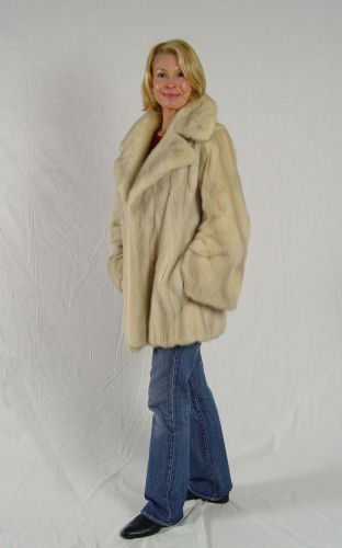 MINK JACKET: MINK JACKET: Cream with a touch of gray and fashioned with wide bell sleeves and swingy back. 31" length, 18' across the shoulders.