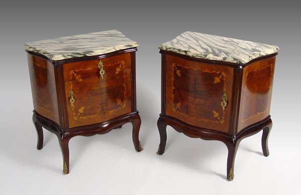 PAIR MARBLE TOP FRENCH NIGHTSTANDS: PAIR MARBLE TOP FRENCH STYLE NIGHTSTANDS: One with small drawer over single door and one with door only, serpentine front, inlay design, 26"h x 23"w. x 13 1/2"d.