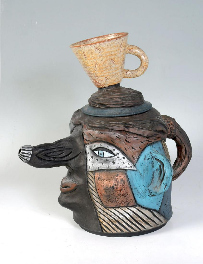DAVID STABLEY ART POTTERY TEAPOT WITH CUP LID: DAVID STABLEY ART POTTERY TEAPOT WITH CUP LID: This piece reminds me of Alice in Wonderland and the Mad Hatter's Tea Party. The pot has a face with a long nose and the lid is topped with a cup. Low re