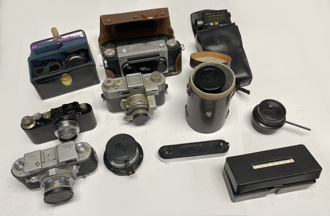 4 CAMERAS AND LENSES: 4 CAMERAS AND LENSES: Kodak 35 Camera Leica Black case Camera serial n 283248, Royal 36s with Leica Lens. Estate of Jon Silengo, Photographer for the Military, Disney and Instructor at El Camino Colle