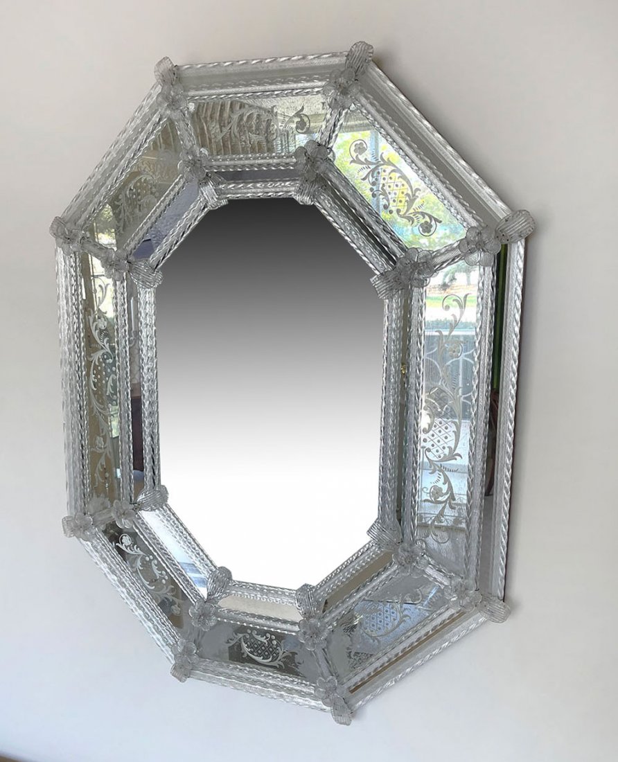 LOVELY ENGRAVED VENETIAN GLASS MIRROR: LOVELY ENGRAVED VENETIAN GLASS MIRROR: Venetian mirror, having a rope twist and applied rosettes, etched glass panels. Approx. 36.5" h x 28.5" w.