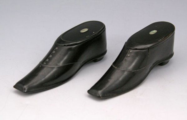 2 PAPER MACHE SHOE FORM NEEDLE CASES: 2 PAPER MACHE SHOE FORM NEEDLE CASES: Mother of pearl inlay on hinged lid. Measures 1 1/4" h x 4".