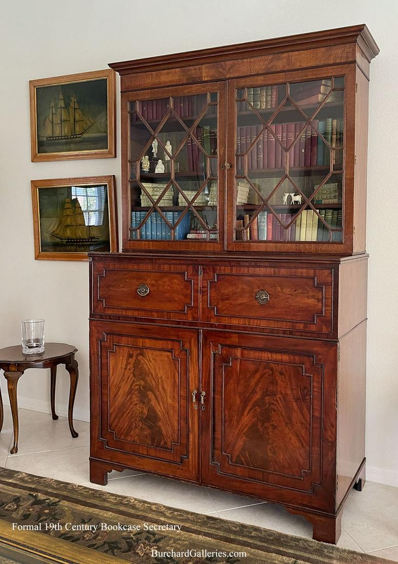 GEORGIAN PERIOD MAHOGANY FORMAL BOOKCASE SECRETARY: AN EXCEPTIONAL GEORGIAN MAHOGANY BOOKCASE SECRETARY: English Georgian period highly grained mahogany secretary bookcase, late 18th C. The top section with a protruding cornice over two glazed doors, o