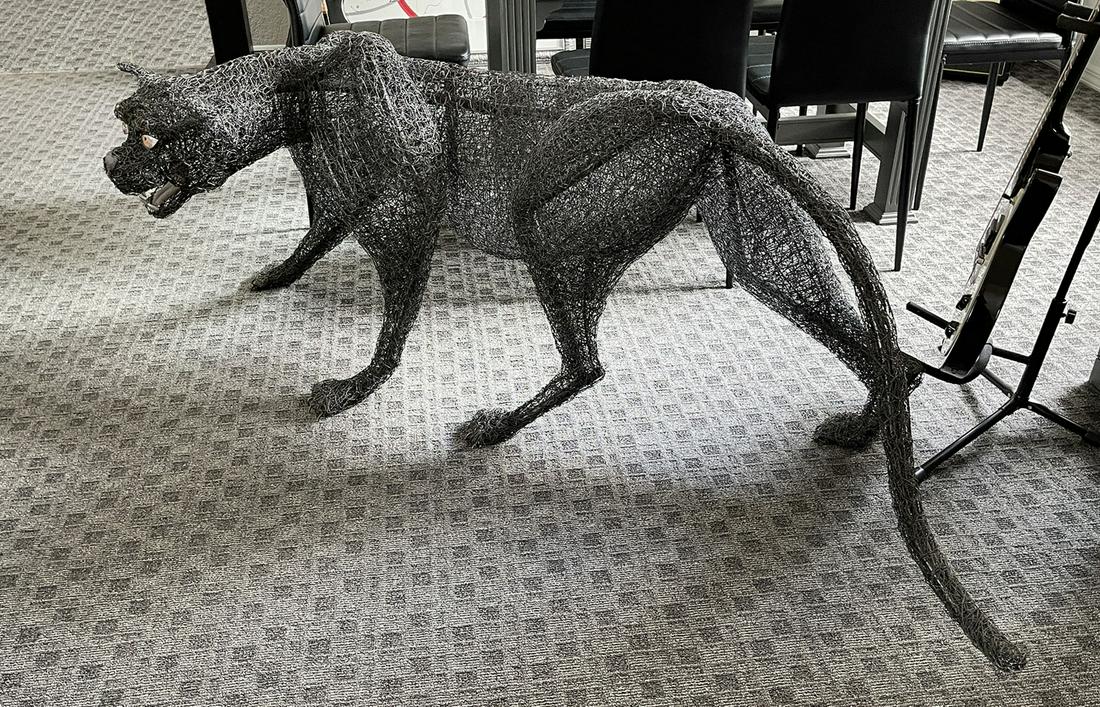 WIRE MESH SCULPTURE OF A PANTHER STUART PETERMAM: STUART PETERMAN WIRE MESH SCULPTURE OF A PANTHER: 27.5"h x 76"l x 24"w
