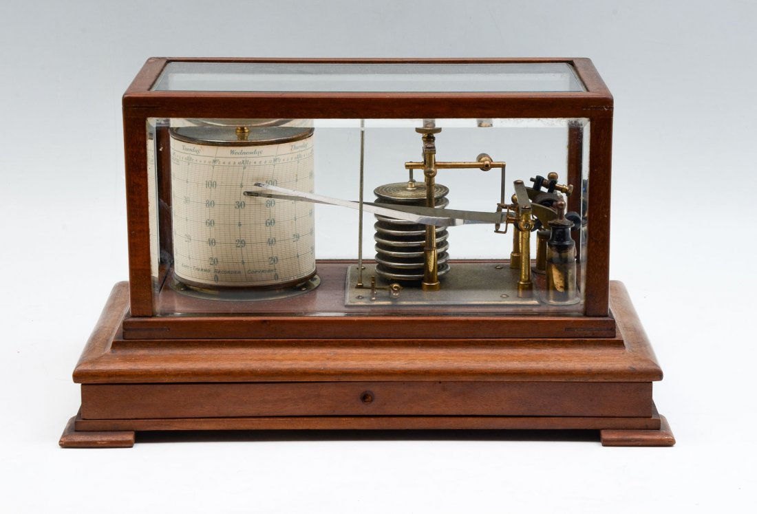 EUROPEAN SEISMOGRAPH IN BEVELED GLASS CASE: EUROPEAN SEISMOGRAPH IN BEVELED GLASS CASE: European scientific instrument, seismograph mounted on a wood single drawer base with a beveled glass cover. Both ink bottles present, ink still present in 