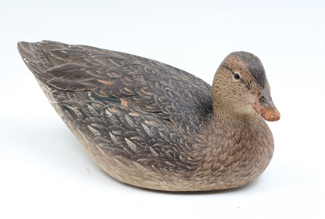 ROGER W. BARTON BLACK DUCK DECOY: ROGER W. BARTON BLACK DUCK DECOY: Carved & painted Duck decoy, signed Roger W. Barton, 1972, at underside. Horseshoe shaped weight at underside, impressed R.W.B. Approx. 4.25" h x 9.75" l x 4.75" w.