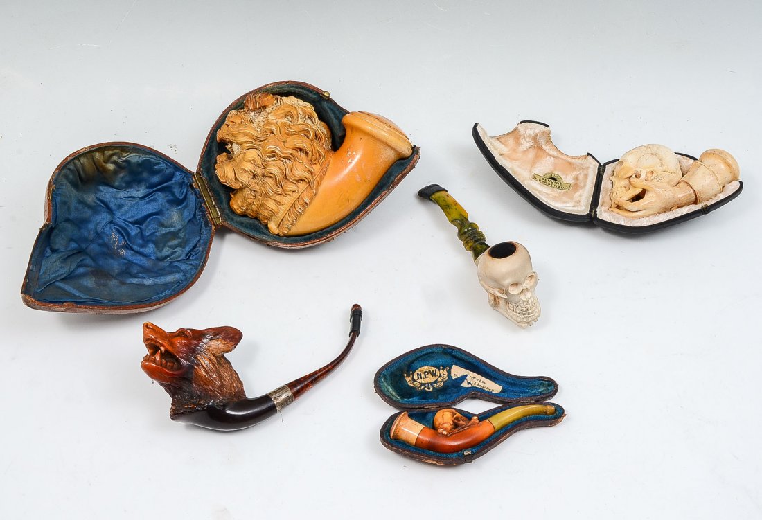 MISC COLLECTION OF PIPES, BOWLS & CHEROOT HOLDERS: MISC COLLECTION OF PIPES, BOWLS & CHEROOT HOLDERS: 1) Wonderful, detailed carving in dark brown Meerschaum of a dog or wolf bearing their teeth with a silver connector and amber mouthpiece, Measures 7