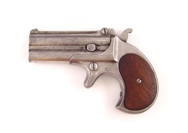 REMINGTON TYPE 1 OVER UNDER DERRINGER PISTOL: REMINGTON TYPE 1 OVER UNDER DERRINGER PISTOL: .41 caliber, 2 line address on rib of barrel, serial number 2805. Has ejector. Action works fine. Early representative example of this gun. Barrel measure