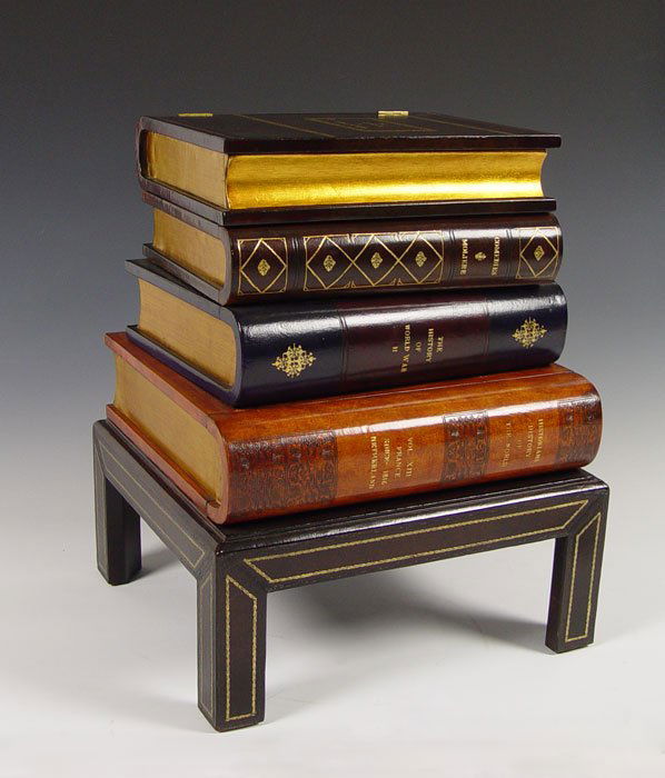MAITLAND SMITH STACKED ''BOOK'' SIDE TABLE: MAITLAND SMITH STACKED ''BOOK'' SIDE TABLE: 4 leather covered books stacked on leather covered wood base. Top book is hinged and opens to storage. Bottom book slides open for drawer.