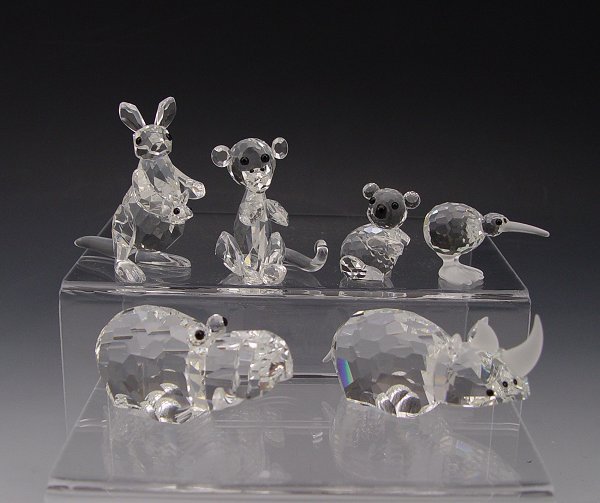SWAROVSKI CRYSTAL ANIMALS FROM AFRICA & AUSTRALIA: SWAROVSKI CRYSTAL FIGURINES FROM AFRICA AND AUSTRALIA: ''African Wildlife'' - 1988 Large Rhinoceros, retired 1992, 2 7/8''; 1988 Large Hippopotamus, retired 1992, 2 5/8''; Zoo Crystal Monkey, approx. 